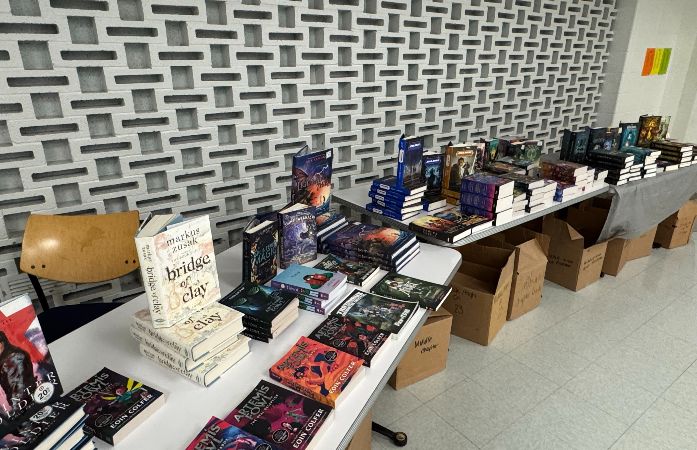 tables with books sitting on them